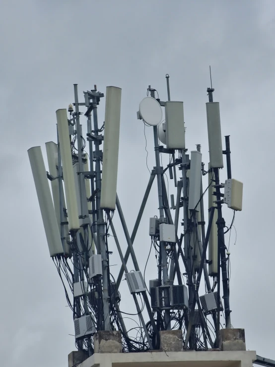 many large cell phone towers are on top of the building