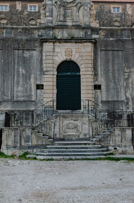 a large building with steps in front of it