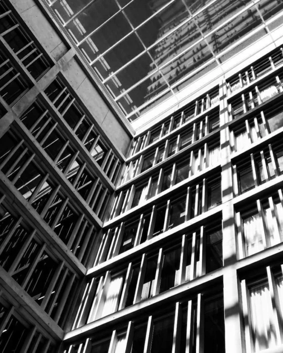 black and white pograph of an office building with many windows