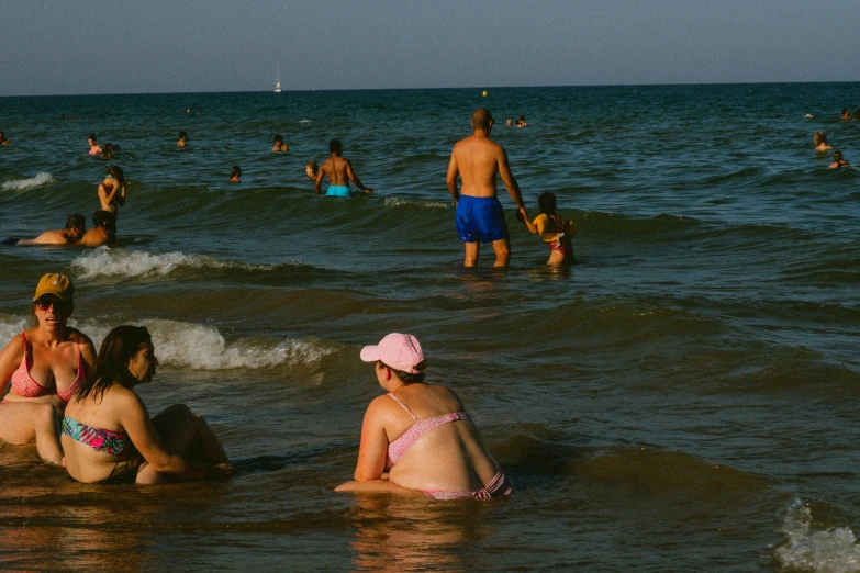 a bunch of people that are in the water