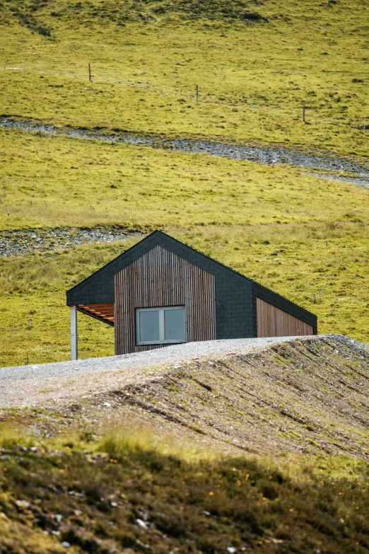 there is a house in the middle of a hill