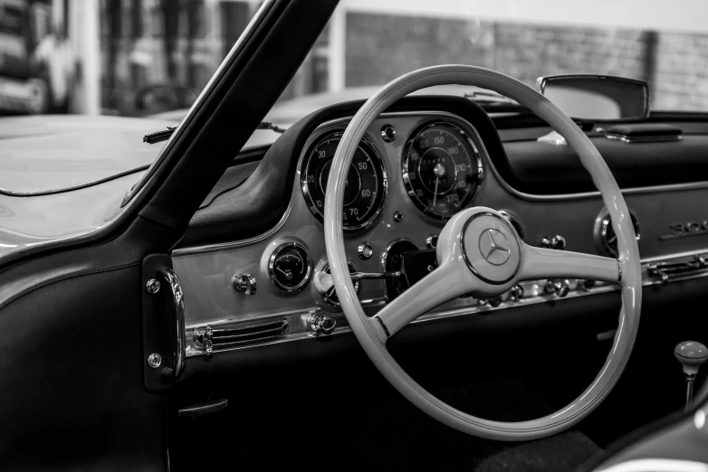 the dashboard in a classic sports car is shown