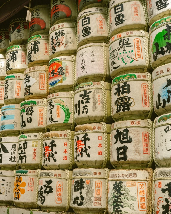 a huge stack of kanji - kodo on sale at a stall