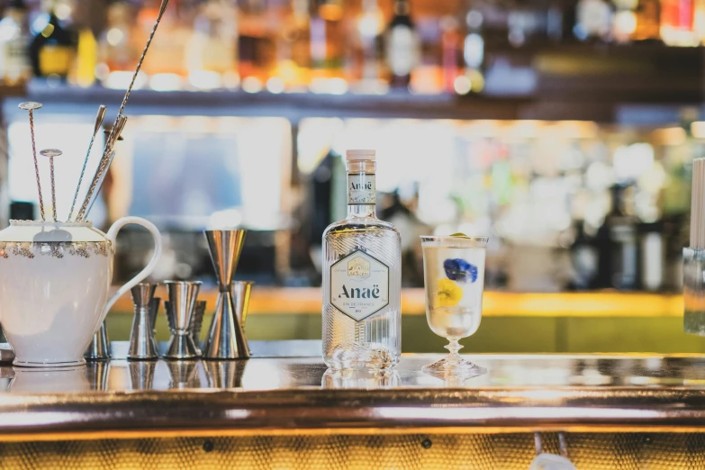 a row of empty glasses sitting on top of a counter