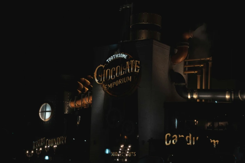 chocolates company sign at night in the city