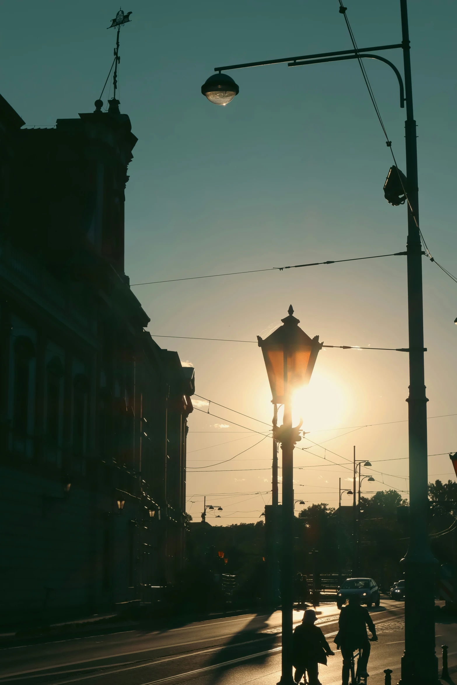 the street is in front of the light pole