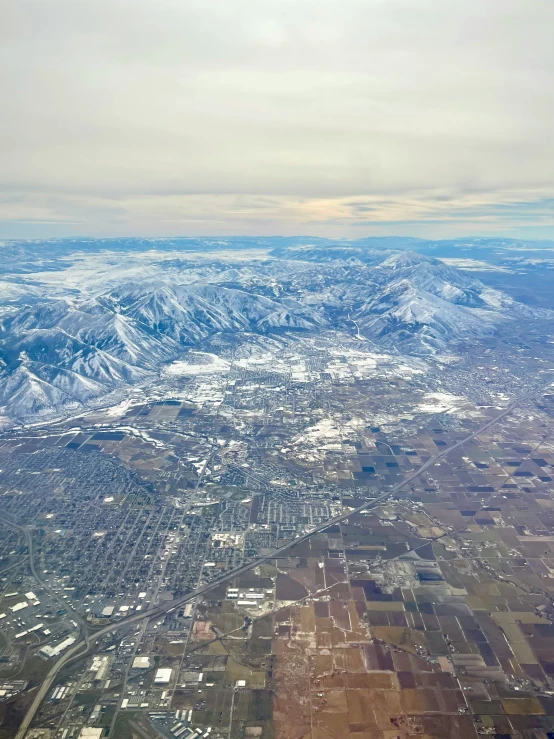 an aerial view of the desert and mountains