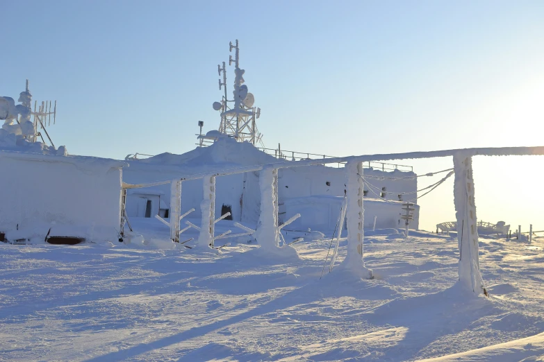 a couple of white buildings in the snow