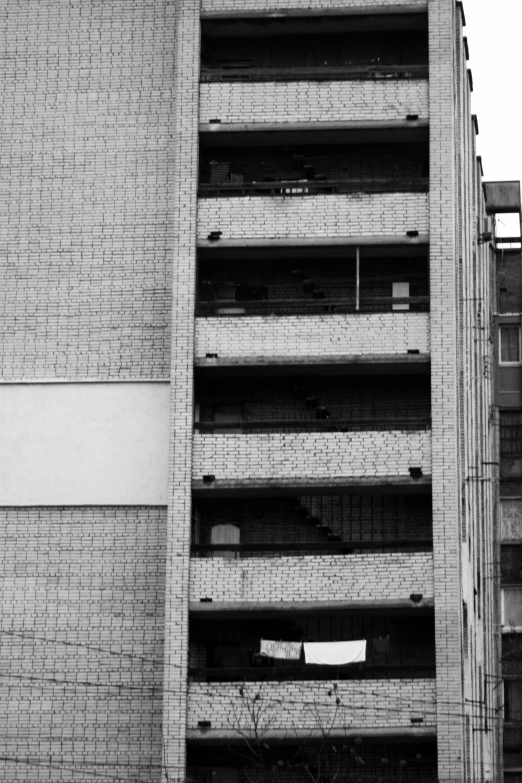 an old brick building with balconies on the side