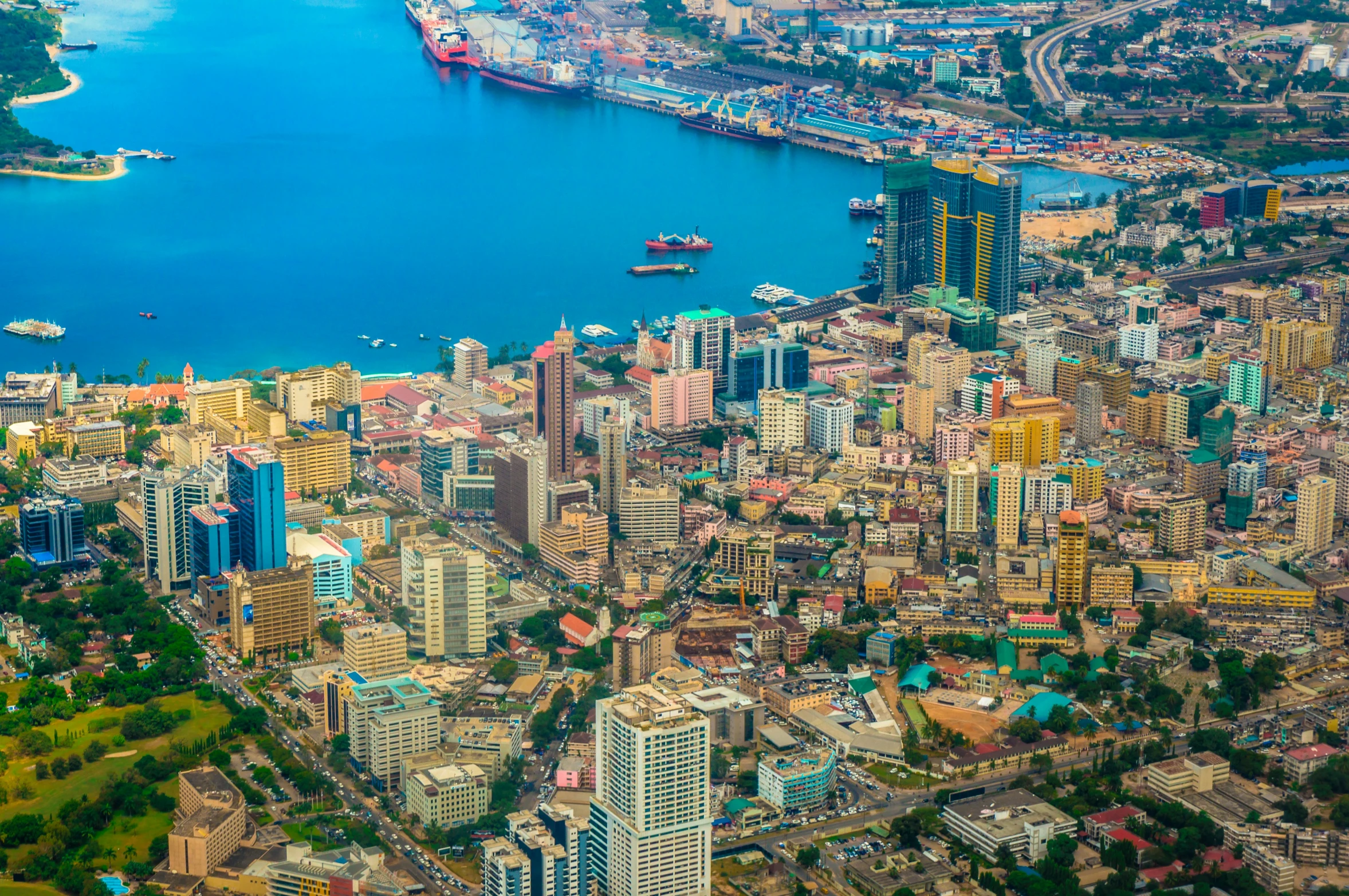 an aerial view of several large city buildings