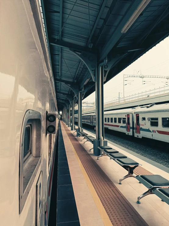 a train at a train station during the day