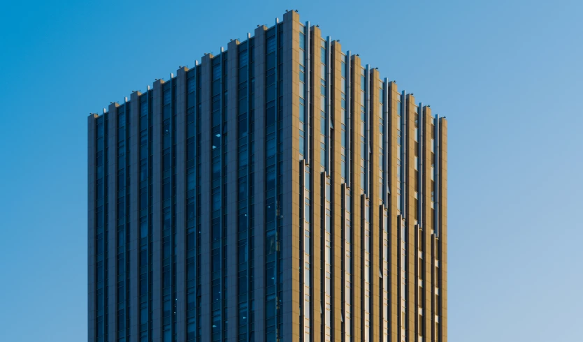 an image of a tall office building seen from the street