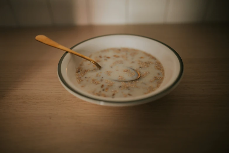 an empty bowl with a spoon inside it