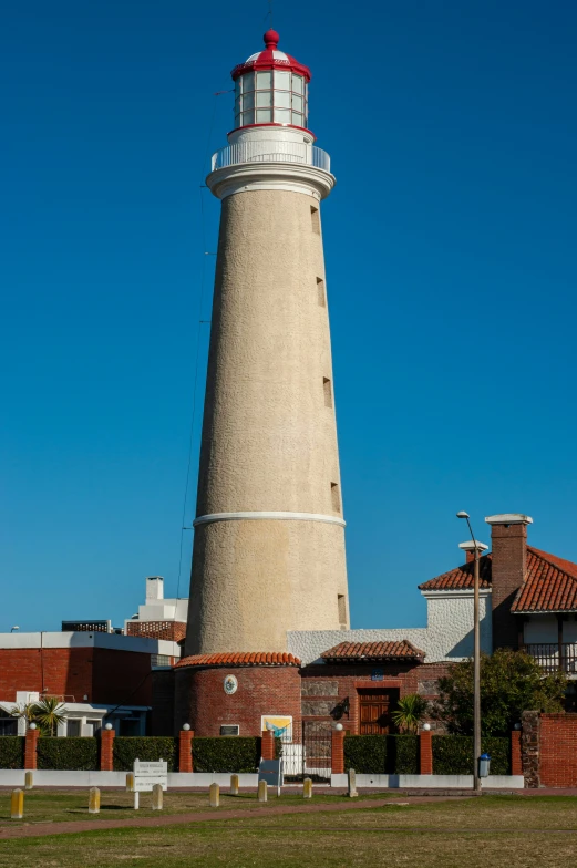 a large tower that is next to some buildings