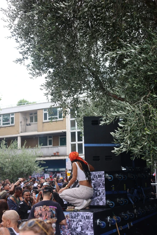 two women are on stage performing at a concert