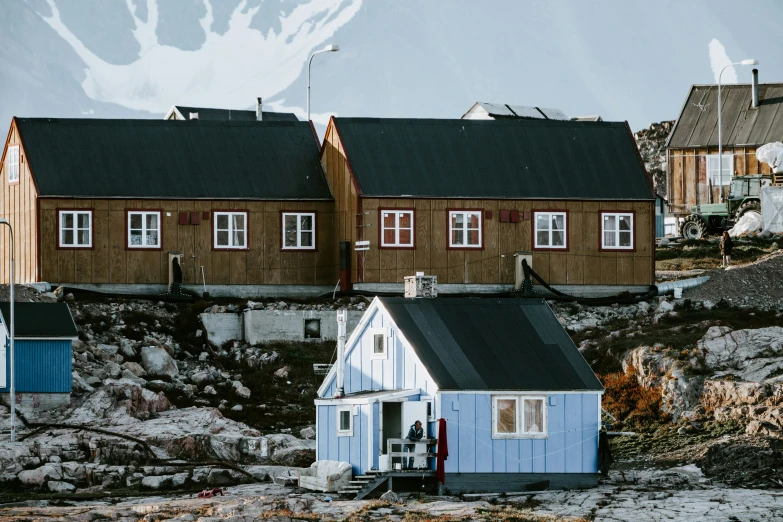 small houses near the mountains are very colorful