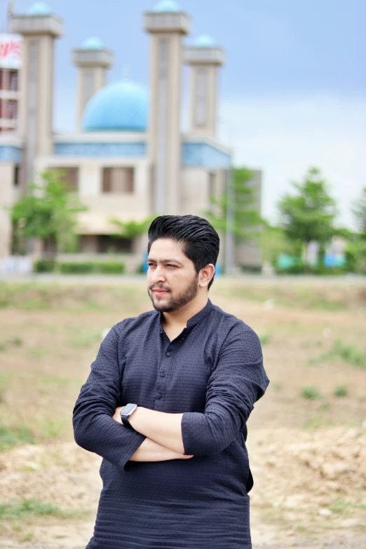 a man standing in the middle of a field