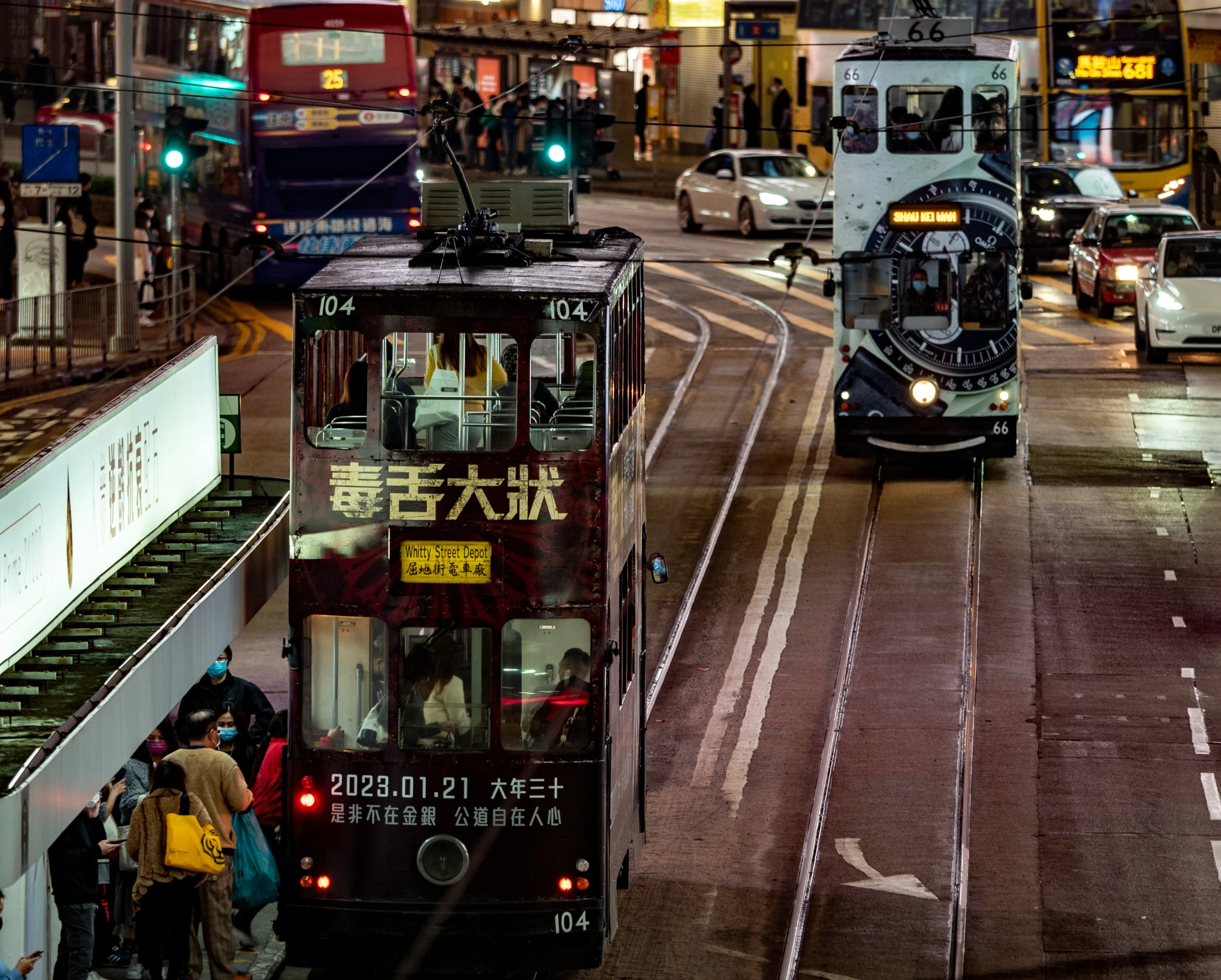 the bus is traveling down the busy city street