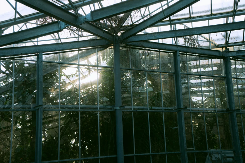 an outside view of a large building made of glass