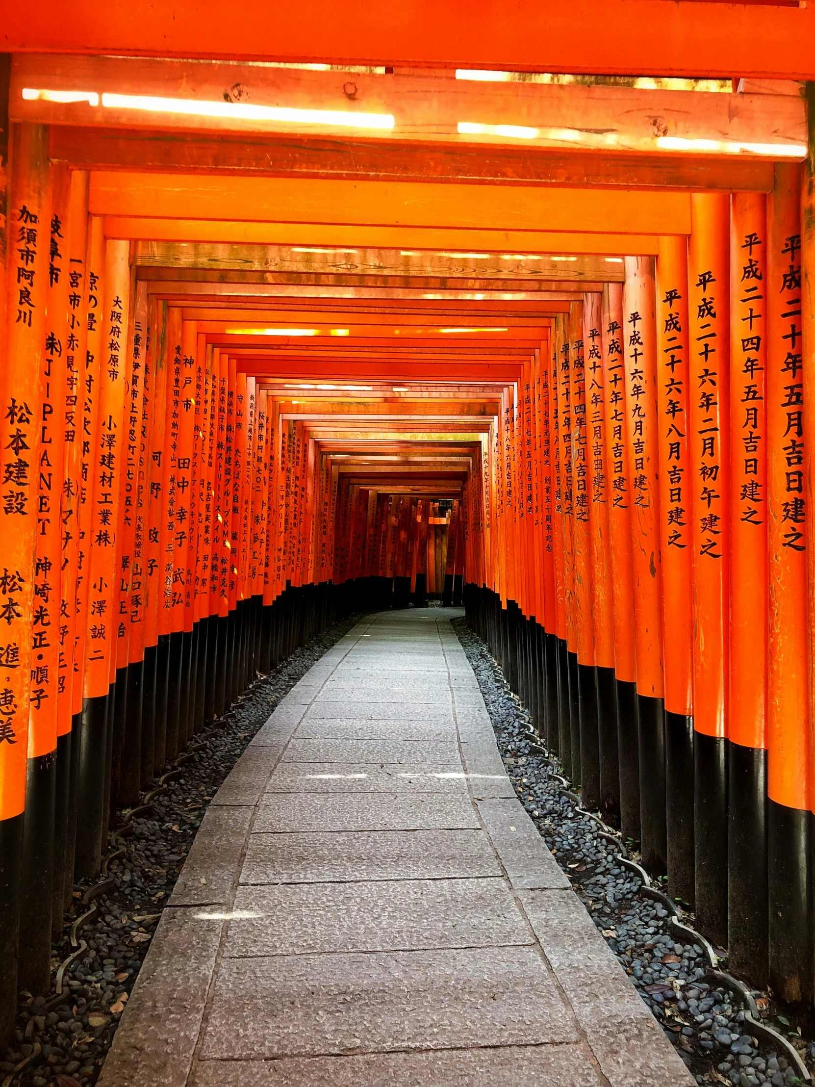 a walkway that has columns on it