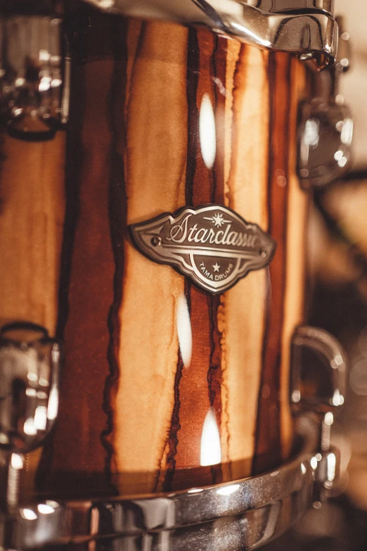 an instrument on display with some wooden grains