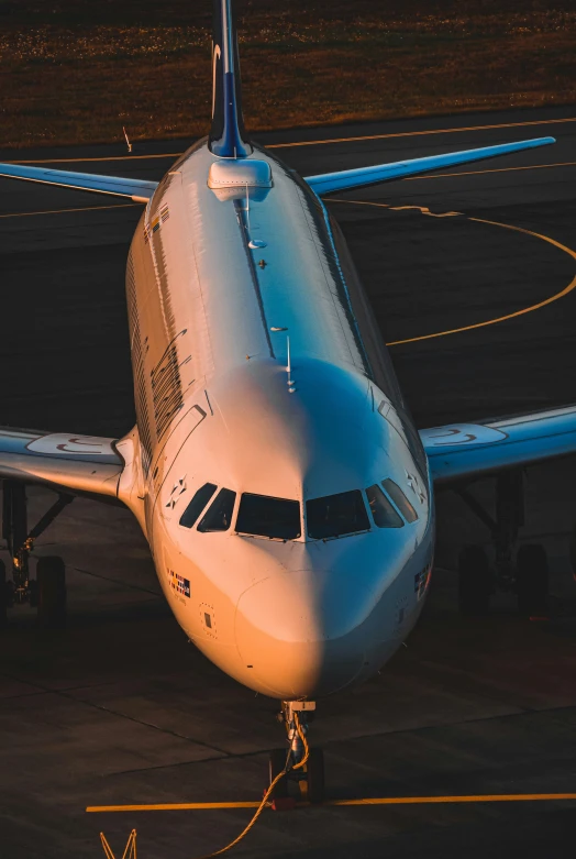 an airplane is on the runway and has landed gear in it