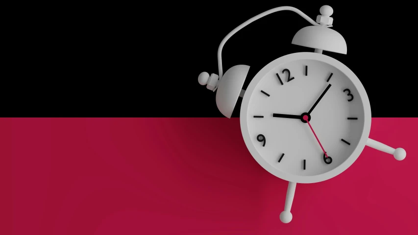 a white clock sitting on the top of a red wall
