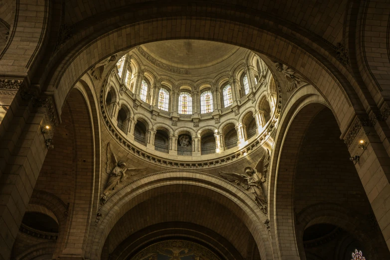 an interior of an old cathedral, looking into the windows