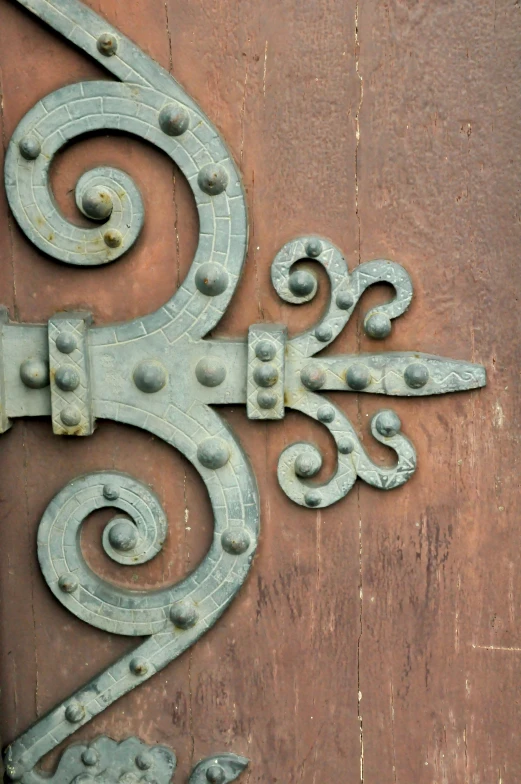 the back end of a carved wooden door