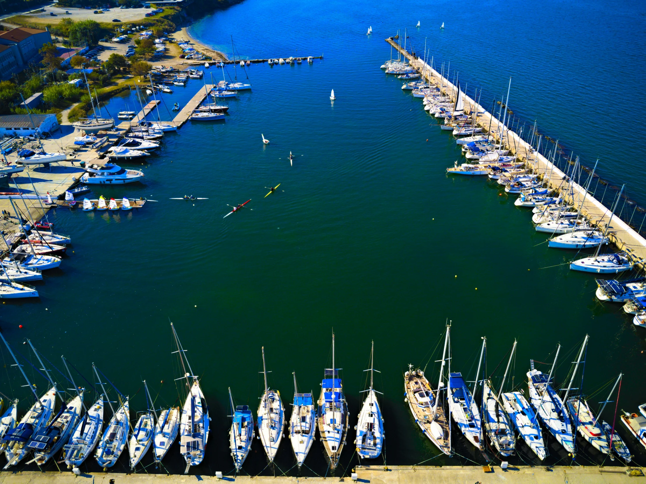 many boats are docked at the marina