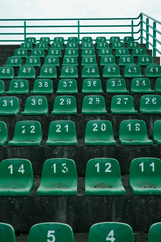 the numbers are on the seats on the stands