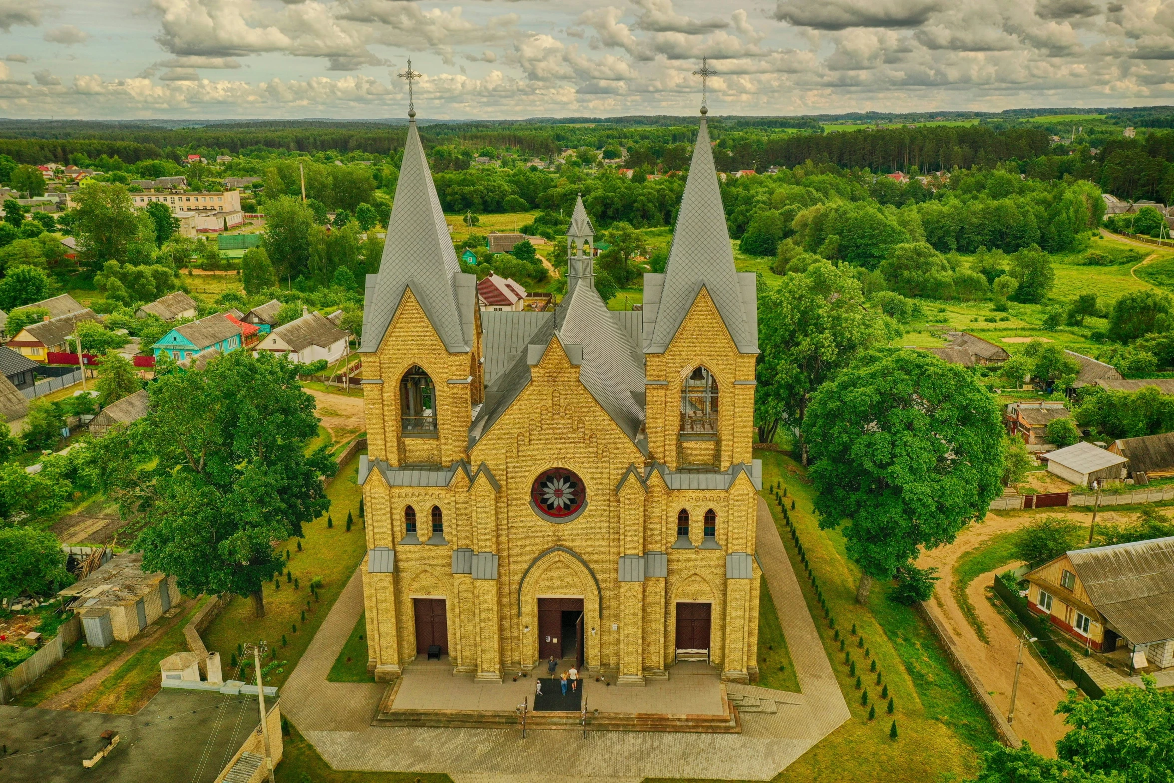 an aerial s of a cathedral church in a large country village