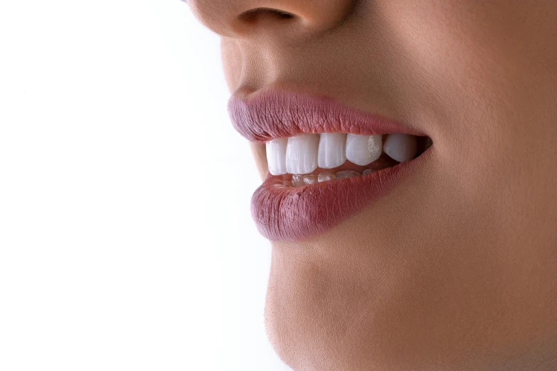 an adult woman's lips with tooth and gum on it