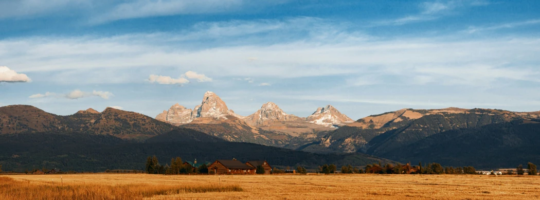 an image of mountains with a sky background