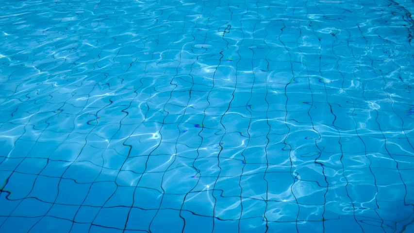 an above - water pool with a pool mat in the middle