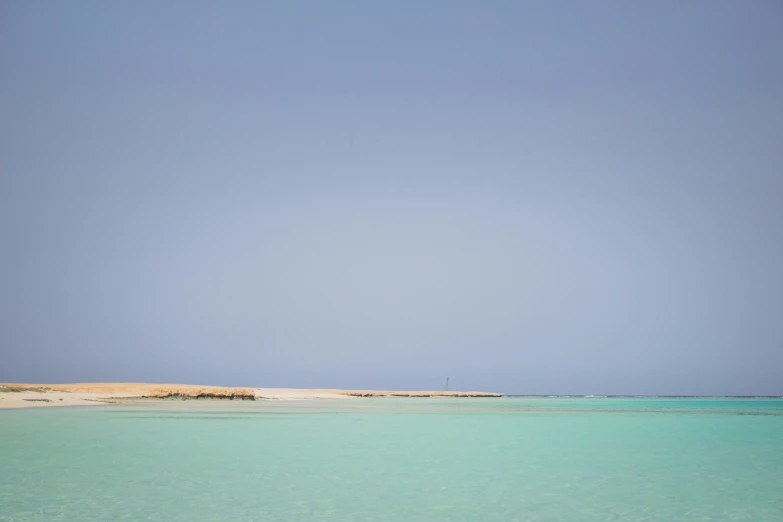 a boat is floating in the ocean