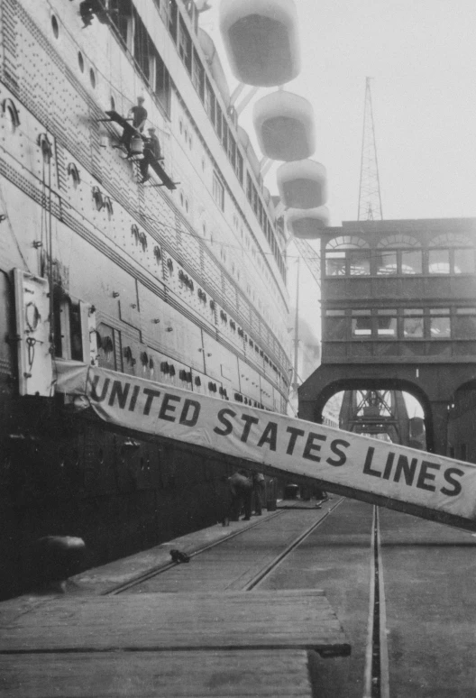 a united states line sign laying in front of a ship