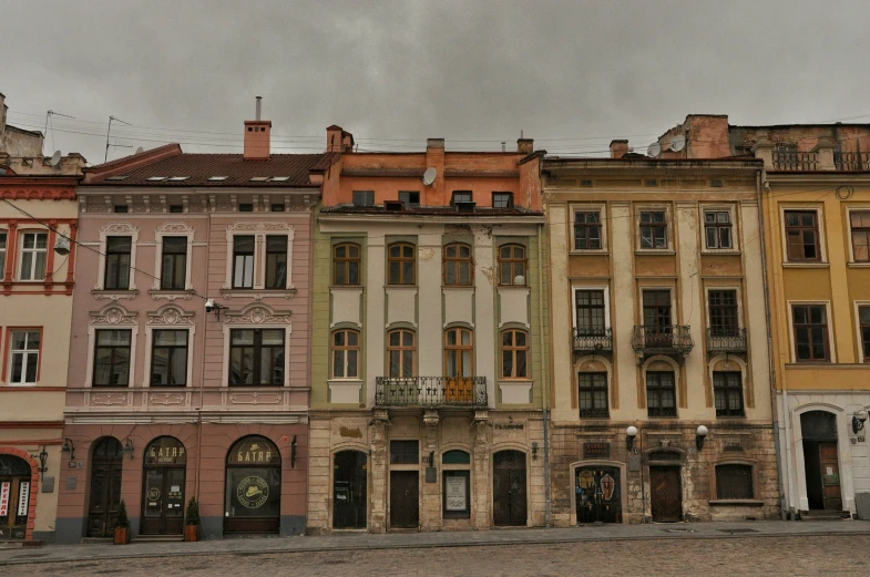 a bunch of buildings with some buildings standing tall