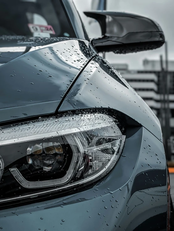 an image of a modern car on a rainy day