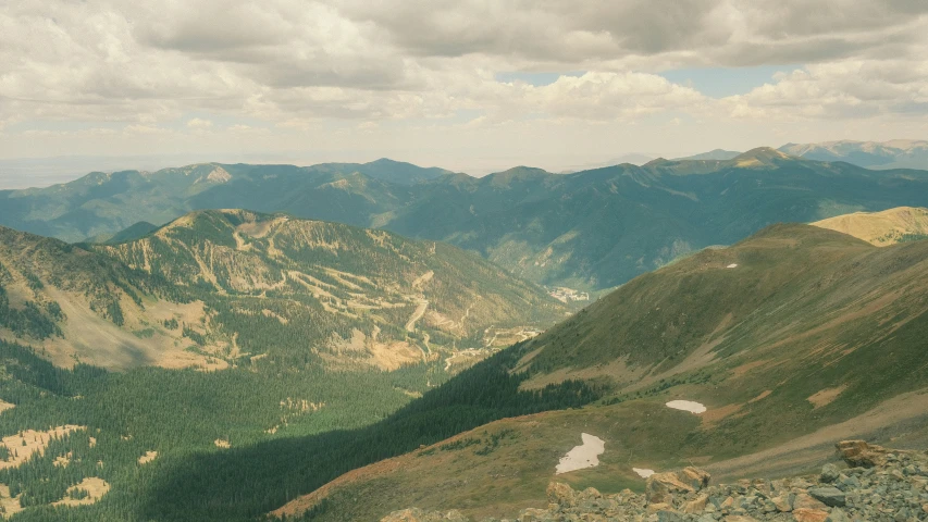 some very pretty mountains by some dirt rocks