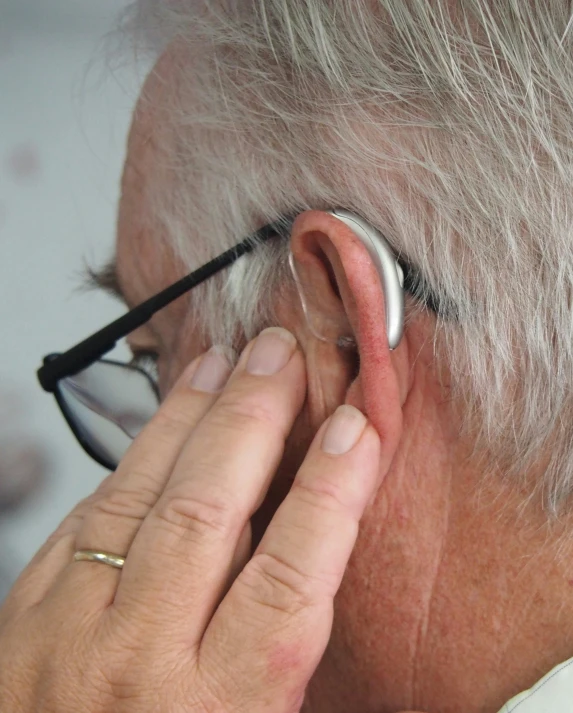 a man wearing a pair of ear phones