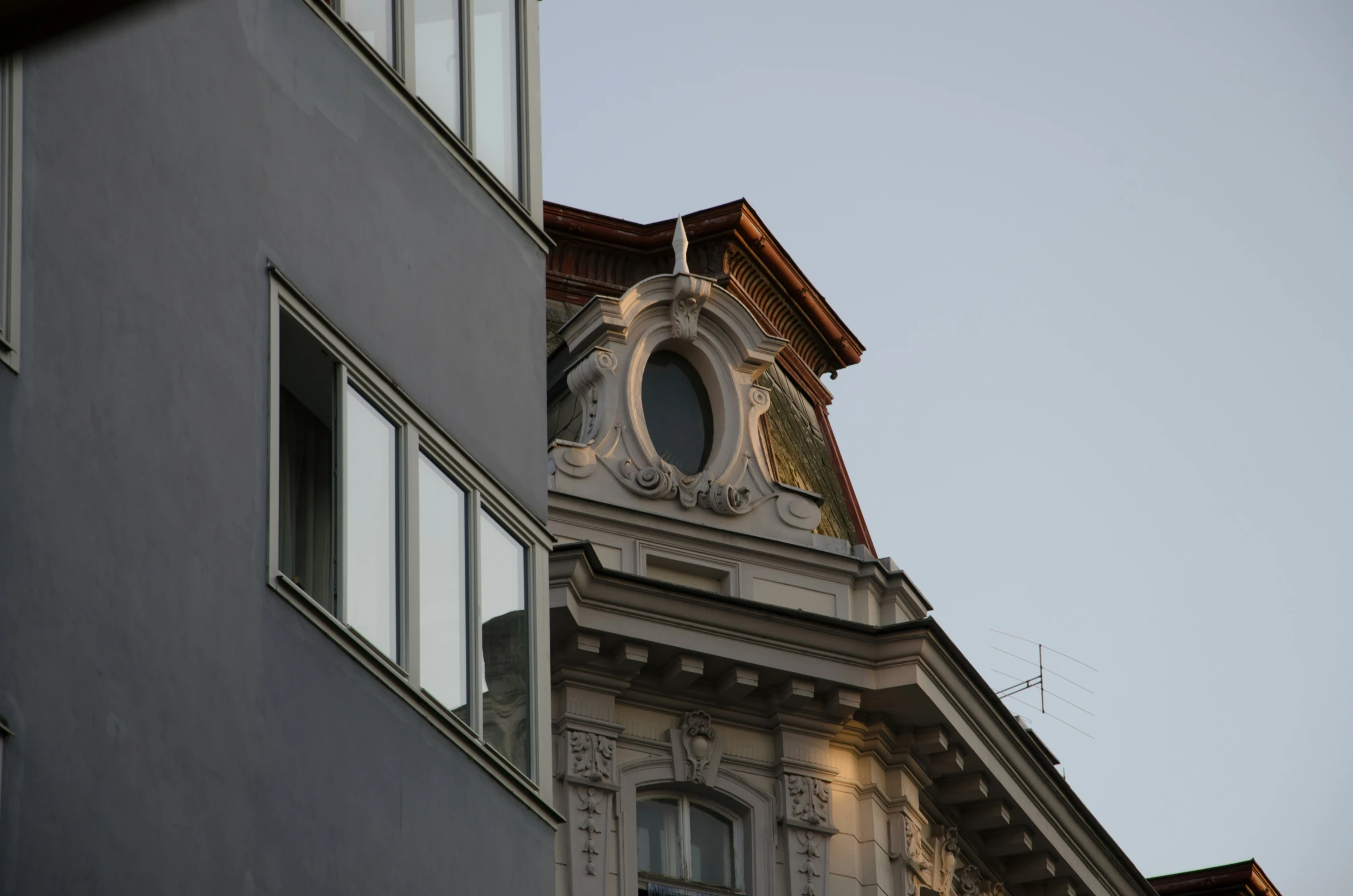 a tall building with some windows on top