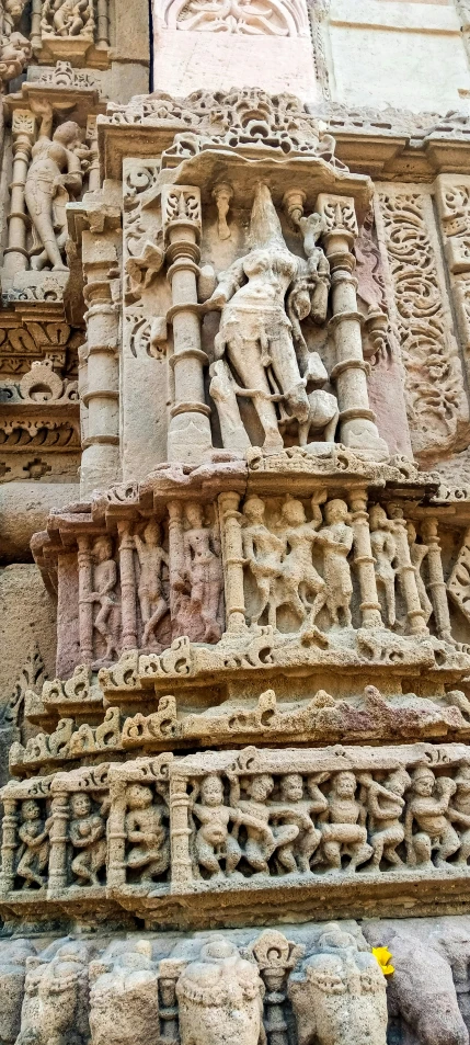 carvings in the outside of an old temple