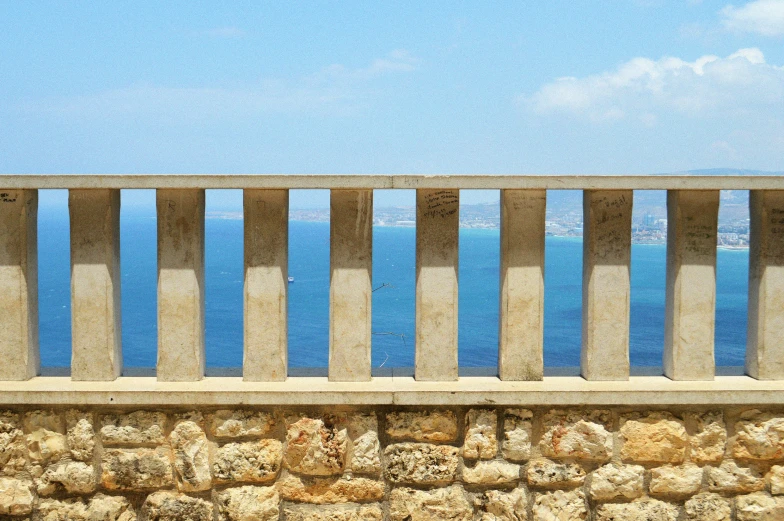 stone balcony over looking ocean with sea view