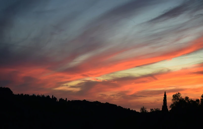 the sky with a tower in the distance