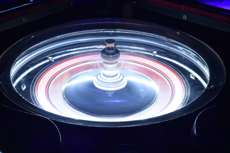 water fountain with circles and lights in the middle