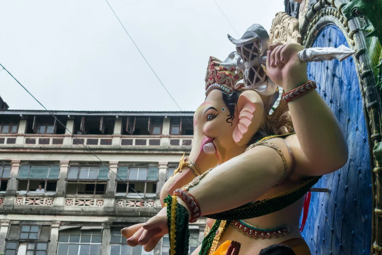 statues depicting deities with the body of a woman