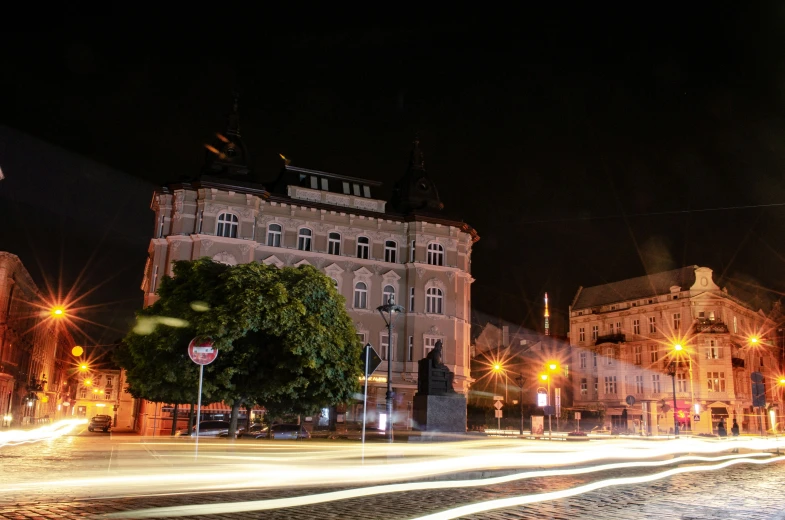 traffic lights shining brightly on the streets of town