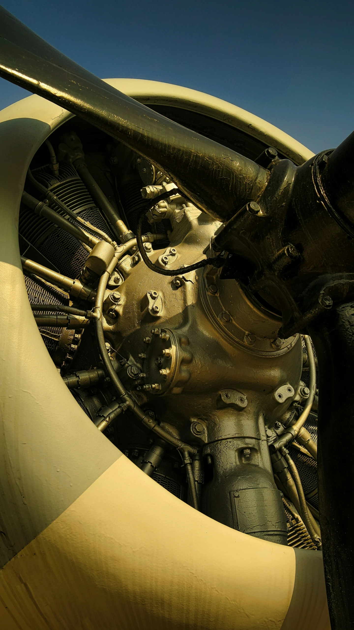 the wheel and propeller of an old airplane