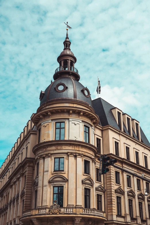 a building with several windows and a tower